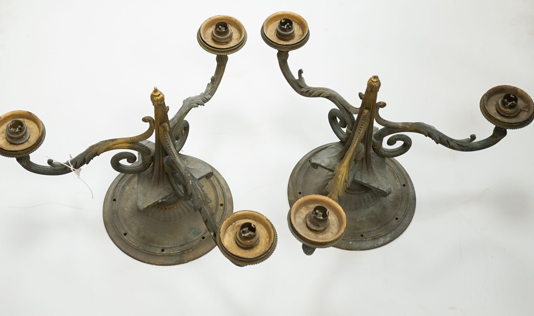 A pair of 3-light ormolu ceiling lights., 36 cms high.